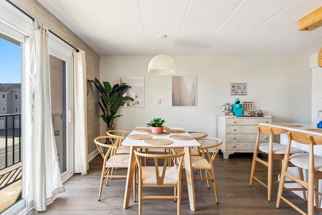 dining room with wood finished floors