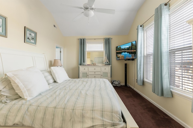 carpeted bedroom with ceiling fan and lofted ceiling