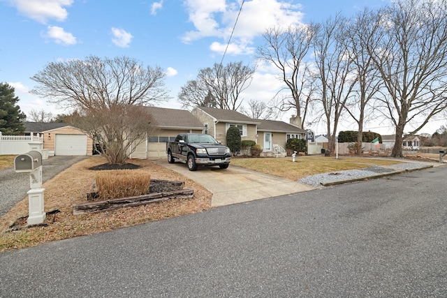 ranch-style house featuring a garage