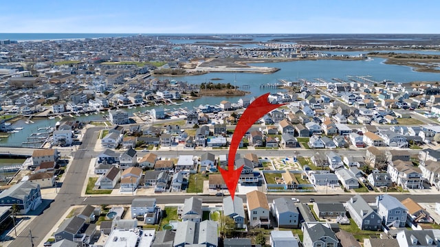 drone / aerial view featuring a water view