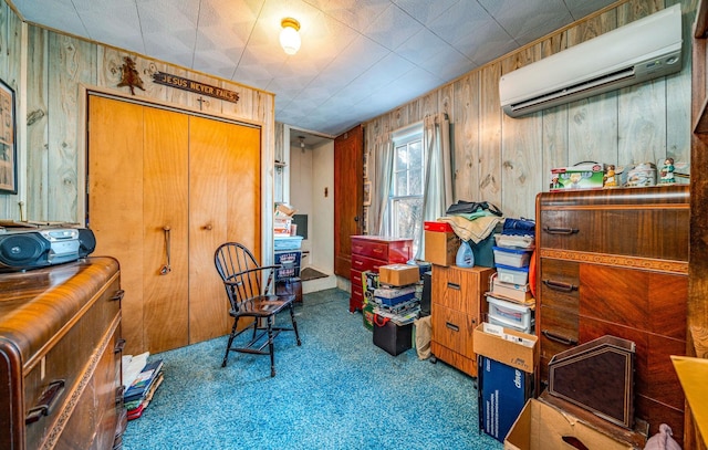 misc room featuring light colored carpet, wooden walls, and a wall mounted AC