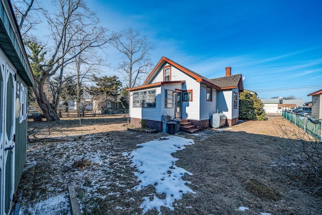 view of snow covered house