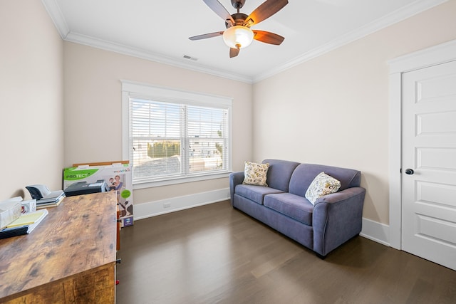 interior space with dark wood-type flooring, ornamental molding, and ceiling fan