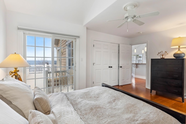 3005 Shore Dr, Cape May Beach, NJ 08251 - bedroom featuring a closet, ceiling fan, baseboards, and wood finished floors