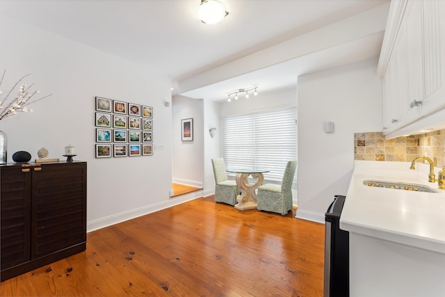 3005 Shore Dr, Cape May Beach, NJ 08251 - dining room featuring light wood finished floors and baseboards