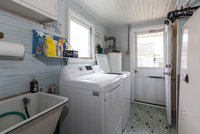 112 E Montgomery Ave, Wildwood, NJ 08260 - laundry room with washing machine and dryer, a sink, a healthy amount of sunlight, and gas water heater