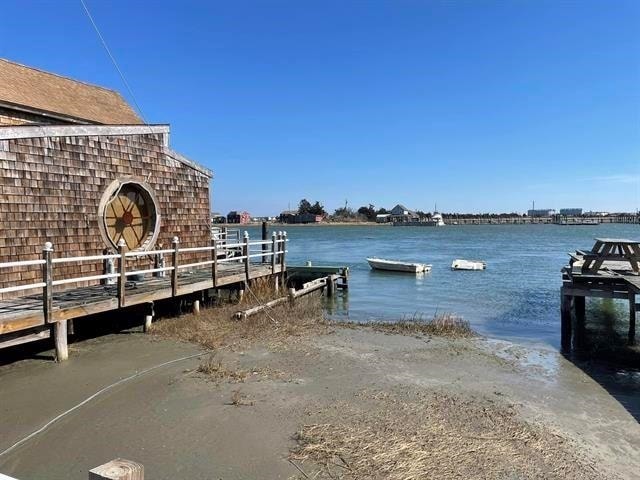 dock area featuring a water view