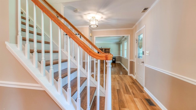 13 Mooring Cir, Seaville, NJ 08230 - staircase with wood finished floors and ornamental molding