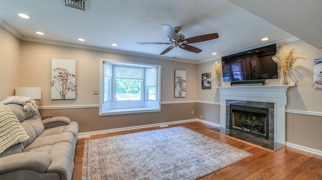 13 Mooring Cir, Seaville, NJ 08230 - living area featuring crown molding, wood finished floors, ceiling fan, a fireplace, and recessed lighting