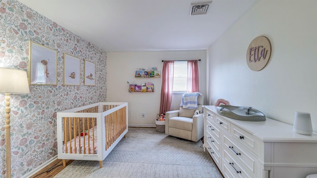 13 Mooring Cir, Seaville, NJ 08230 - bedroom featuring wallpapered walls and a nursery area