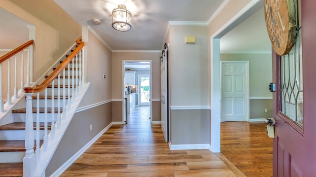 13 Mooring Cir, Seaville, NJ 08230 - foyer with wood finished floors, stairs, ornamental molding, and a chandelier
