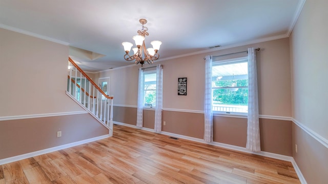 13 Mooring Cir, Seaville, NJ 08230 - unfurnished room with stairs, a chandelier, wood finished floors, and ornamental molding