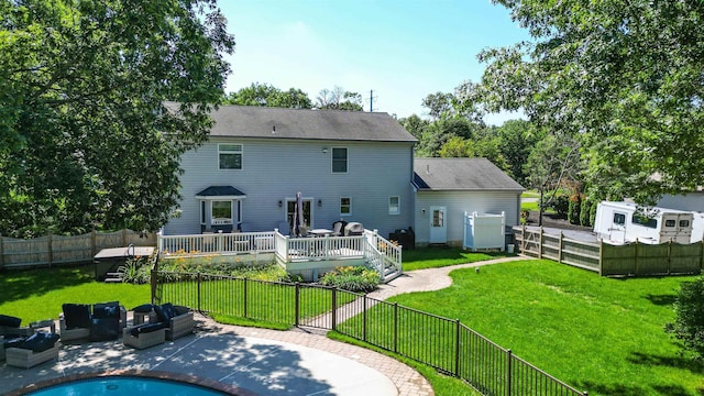 13 Mooring Cir, Seaville, NJ 08230 - rear view of property with a wooden deck, a fenced backyard, and a patio