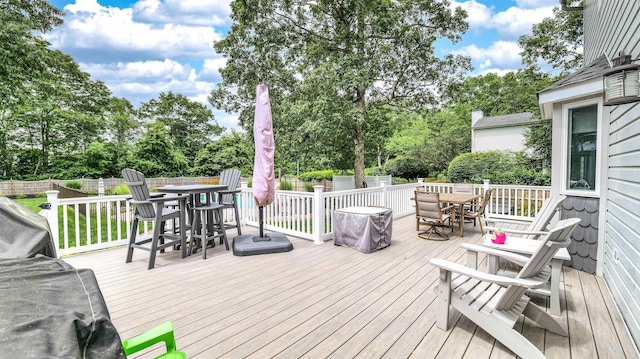 13 Mooring Cir, Seaville, NJ 08230 - wooden terrace with outdoor dining space, a fenced backyard, and view of scattered trees