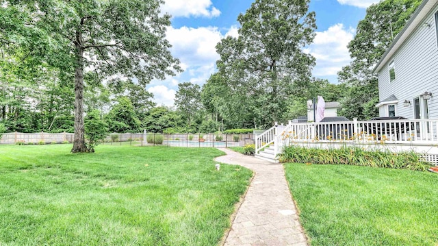 13 Mooring Cir, Seaville, NJ 08230 - view of yard with a deck and view of scattered trees