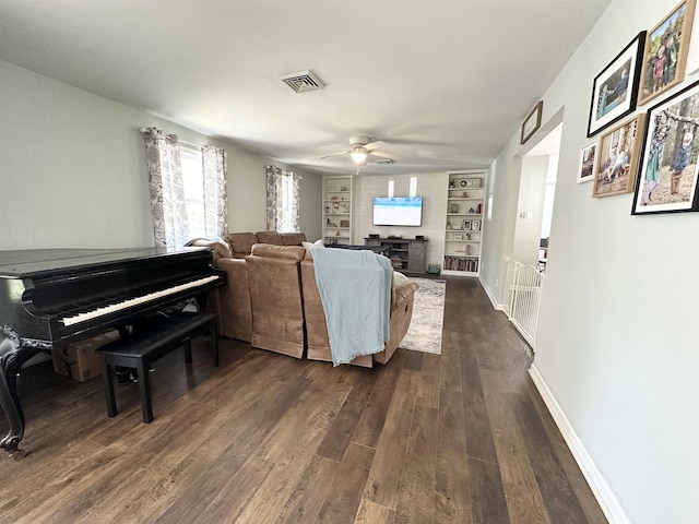 49 Hope Corson Rd, Ocean View, NJ 08230 - living room featuring ceiling fan, dark wood-type flooring, built in shelves, and baseboards