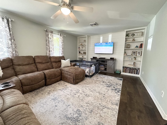 49 Hope Corson Rd, Ocean View, NJ 08230 - living area with wood finished floors, baseboards, ceiling fan, and built in features