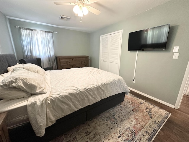49 Hope Corson Rd, Ocean View, NJ 08230 - bedroom with baseboards, wood finished floors, a closet, and a ceiling fan