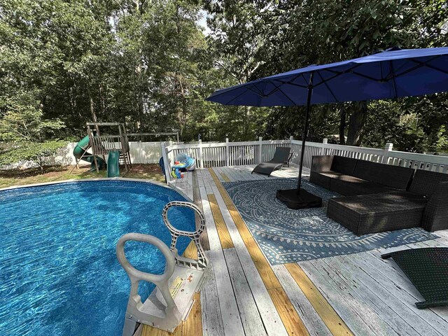 49 Hope Corson Rd, Ocean View, NJ 08230 - view of yard featuring a wooden deck, a covered pool, and view of wooded area