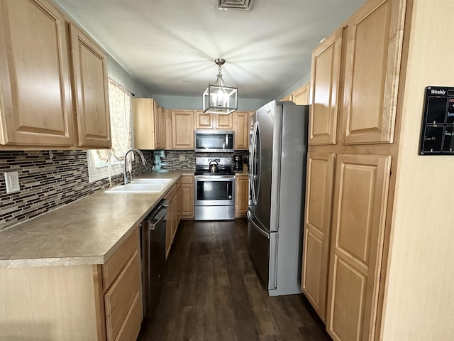 49 Hope Corson Rd, Ocean View, NJ 08230 - kitchen with stainless steel appliances, light brown cabinets, a sink, decorative backsplash, and dark wood-style floors