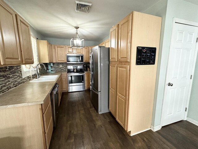 49 Hope Corson Rd, Ocean View, NJ 08230 - kitchen featuring stainless steel appliances, a sink, light brown cabinets, and dark wood-style floors