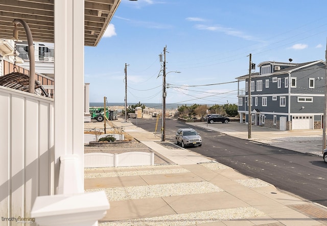 25 81st St W, Unit West, Sea Isle City, NJ 08243 - view of road featuring street lighting, sidewalks, and curbs