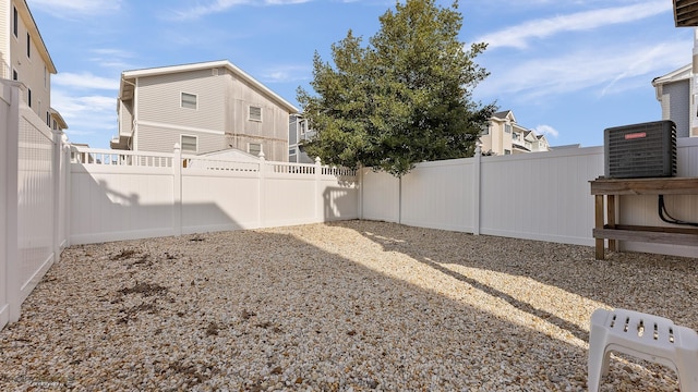 25 81st St W, Unit West, Sea Isle City, NJ 08243 - view of yard featuring central AC and a fenced backyard