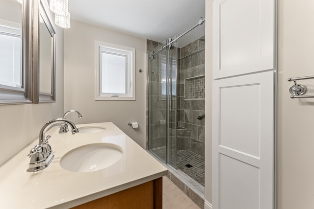 25 81st St W, Unit West, Sea Isle City, NJ 08243 - full bath with a sink, tile patterned flooring, a shower stall, and double vanity