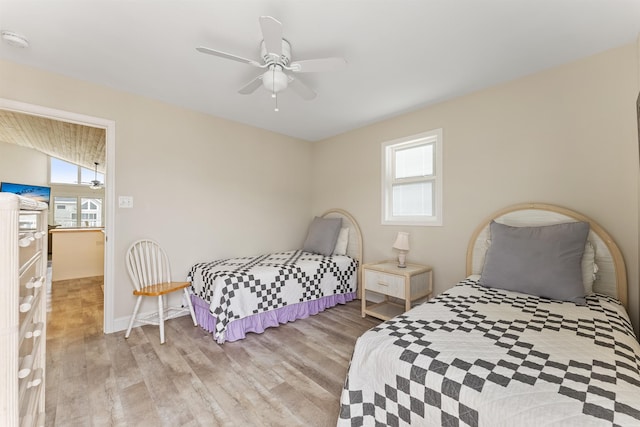 25 81st St W, Unit West, Sea Isle City, NJ 08243 - bedroom featuring a ceiling fan, baseboards, and light wood-type flooring