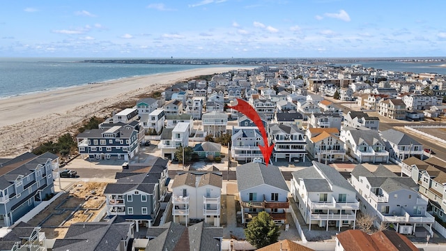 25 81st St W, Unit West, Sea Isle City, NJ 08243 - drone / aerial view featuring a view of the beach, a residential view, and a water view