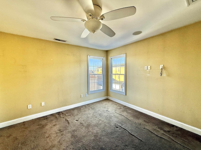 carpeted empty room with ceiling fan