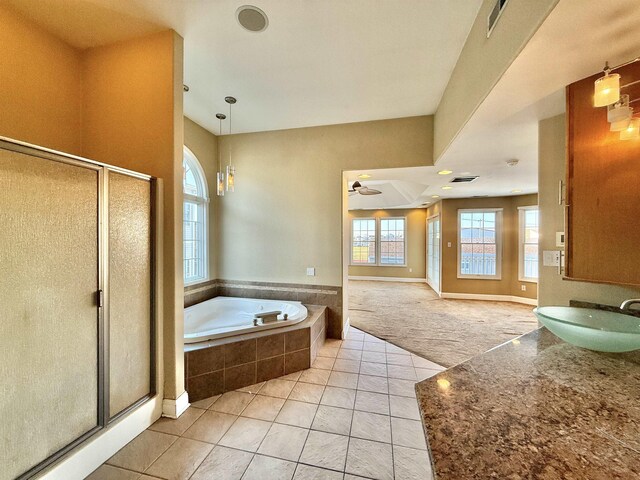 bathroom with separate shower and tub, ceiling fan, tile patterned flooring, and vanity