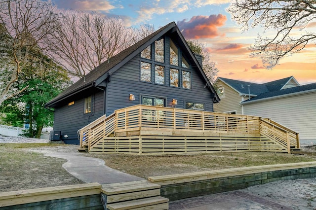 512 Robin Rd, Villas, NJ 08251 - back of property at dusk featuring a deck and stairway