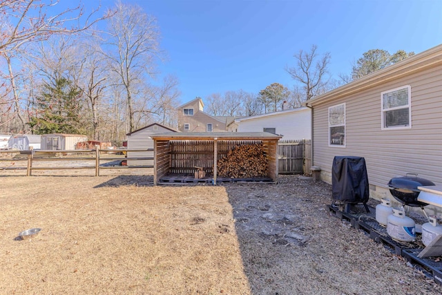 view of yard with fence