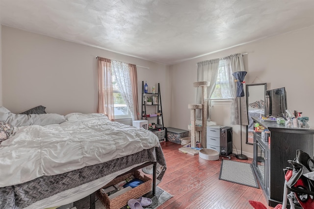 237 Lennox Ave, North Cape May, NJ 08204 - bedroom featuring multiple windows and wood finished floors