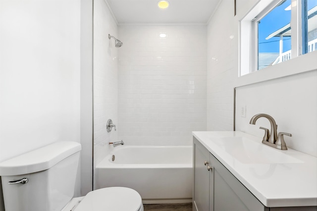 bathroom featuring shower / tub combination, vanity, and toilet