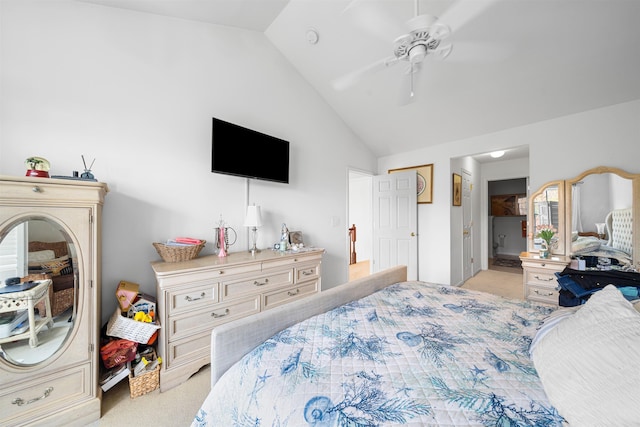 carpeted bedroom with ceiling fan and lofted ceiling