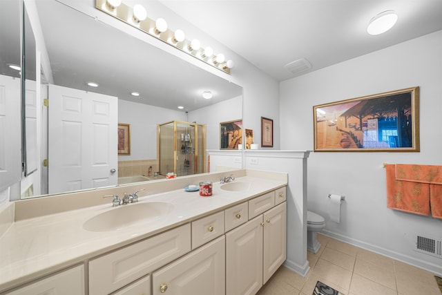 full bathroom featuring plus walk in shower, vanity, tile patterned floors, and toilet