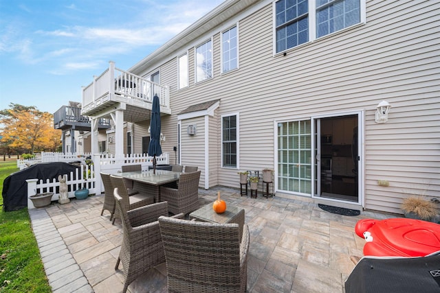 view of patio / terrace with a balcony