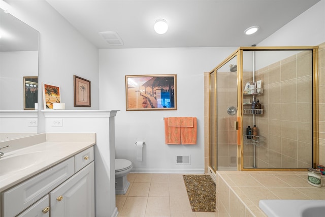 full bathroom with tile patterned flooring, shower with separate bathtub, vanity, and toilet