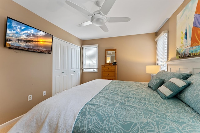 bedroom featuring a closet and ceiling fan