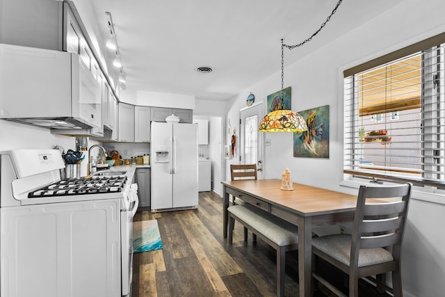 547 W Magnolia Ave, West Wildwood, NJ 08260 - kitchen with white appliances, a sink, dark wood finished floors, gray cabinetry, and plenty of natural light