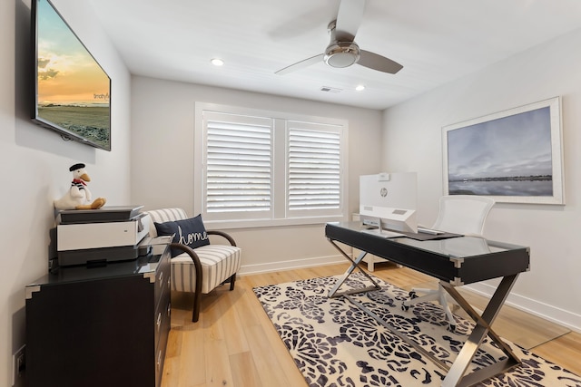 home office with ceiling fan and wood-type flooring