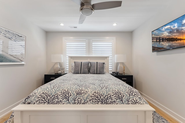 bedroom featuring ceiling fan and wood-type flooring