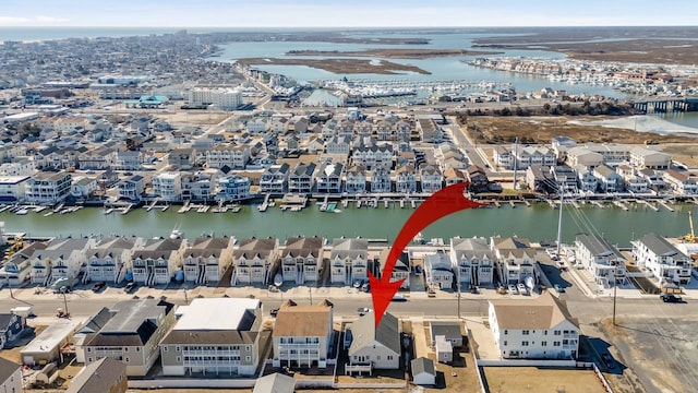 aerial view with a water view and a residential view