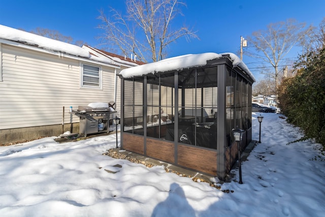 exterior space with a sunroom