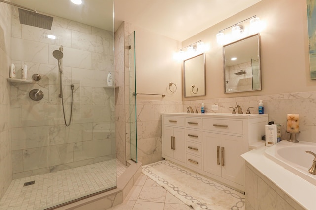 bathroom with vanity, plus walk in shower, and tile walls