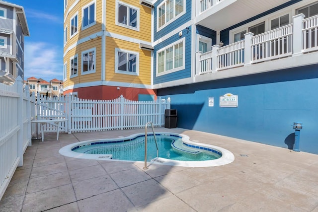 view of pool featuring a patio