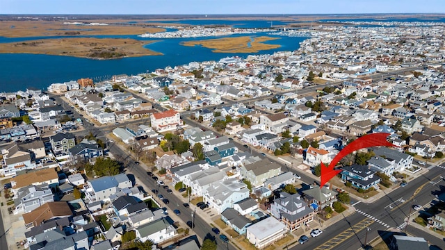 drone / aerial view featuring a water view