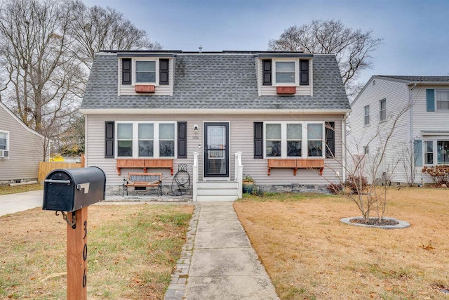 view of front of house with a front lawn